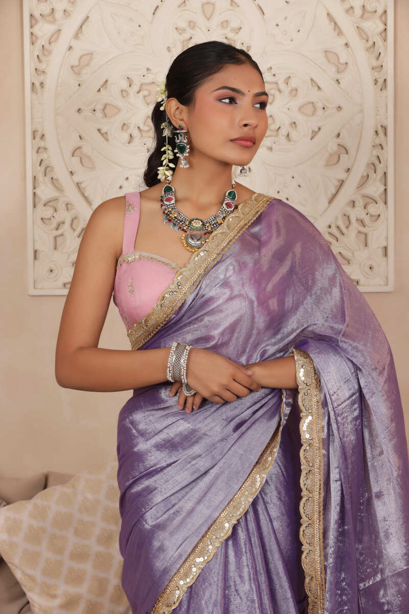 LUSTROUS LAVENDER TISSUE KADHI SAREE WITH INTRICATE LACE EMBELLISHMENT
